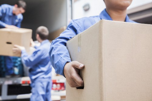 A moving van and boxes prepared for a home move in Harringay