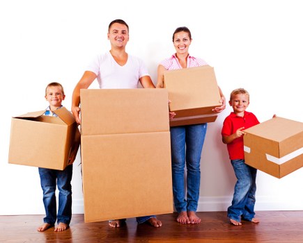 Office relocation planning in Harringay with moving boxes and desk setup