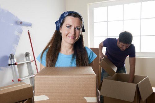 Local moving crew handling boxes and household items in Harringay
