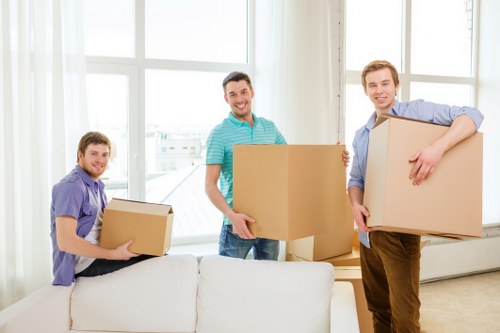 Moving van loading household items for a North London house removal