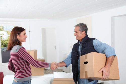 Packed furniture and boxes ready for a local move in Harringay
