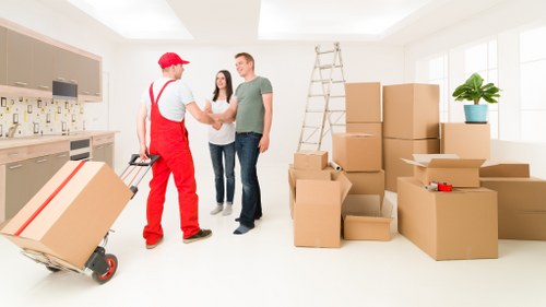 Loading furniture into a removal van on a Harringay residential street