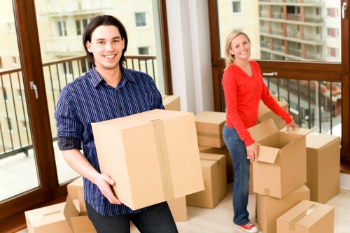 Office furniture and equipment being prepared for a local commercial removal